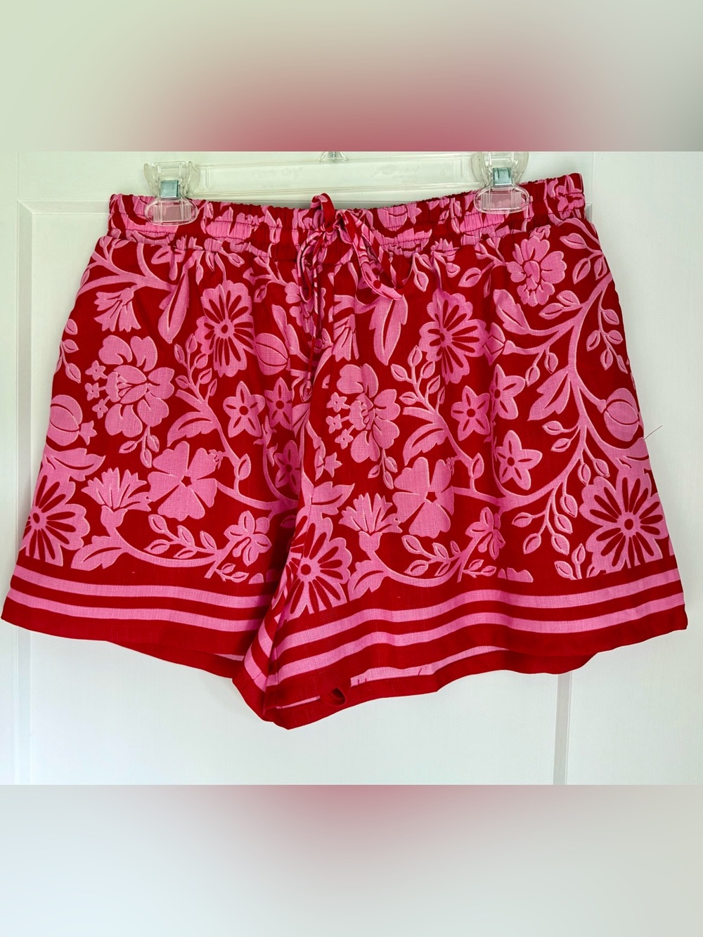Francesca's Collections Pink Floral Drawstring Athletic Shorts on Red
